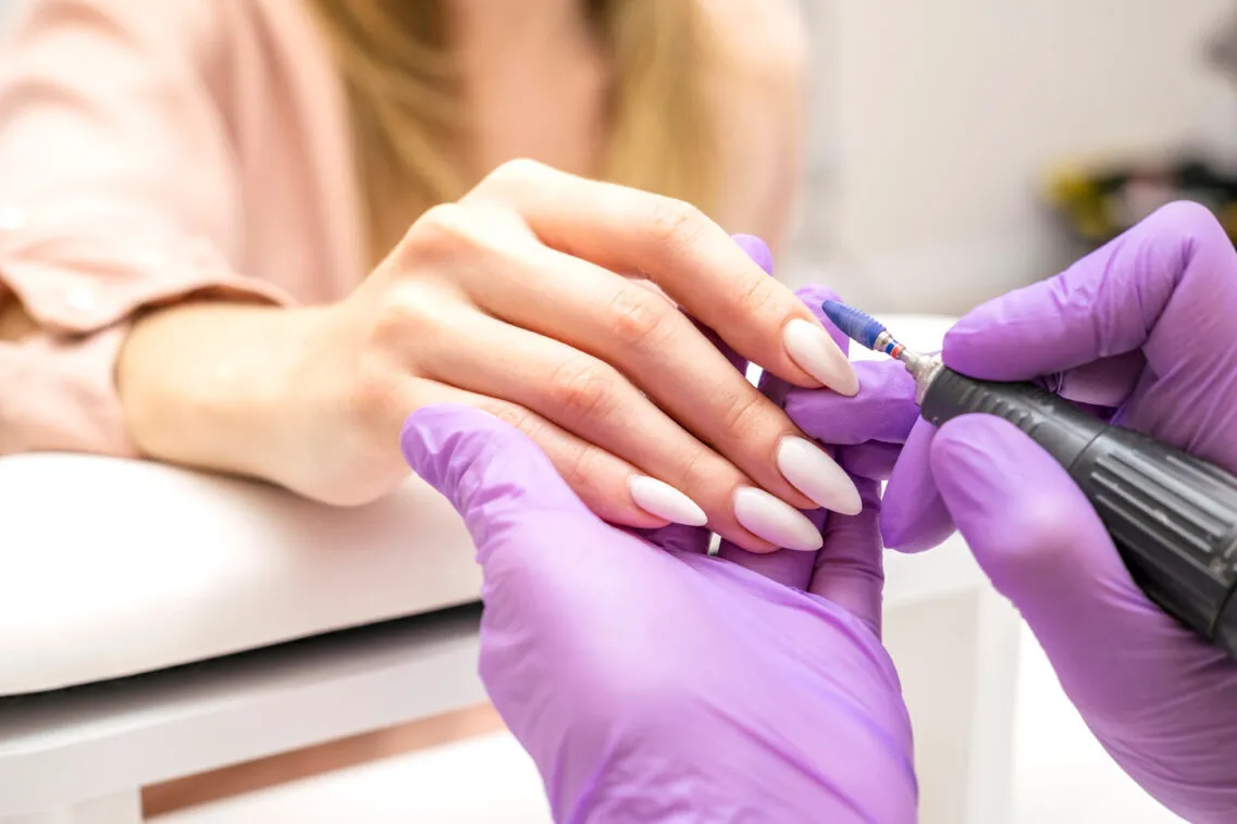 Nail technician at work