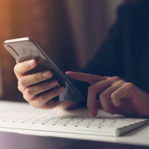 Person using the REC app on the Apple Store on their Apple smartphone
